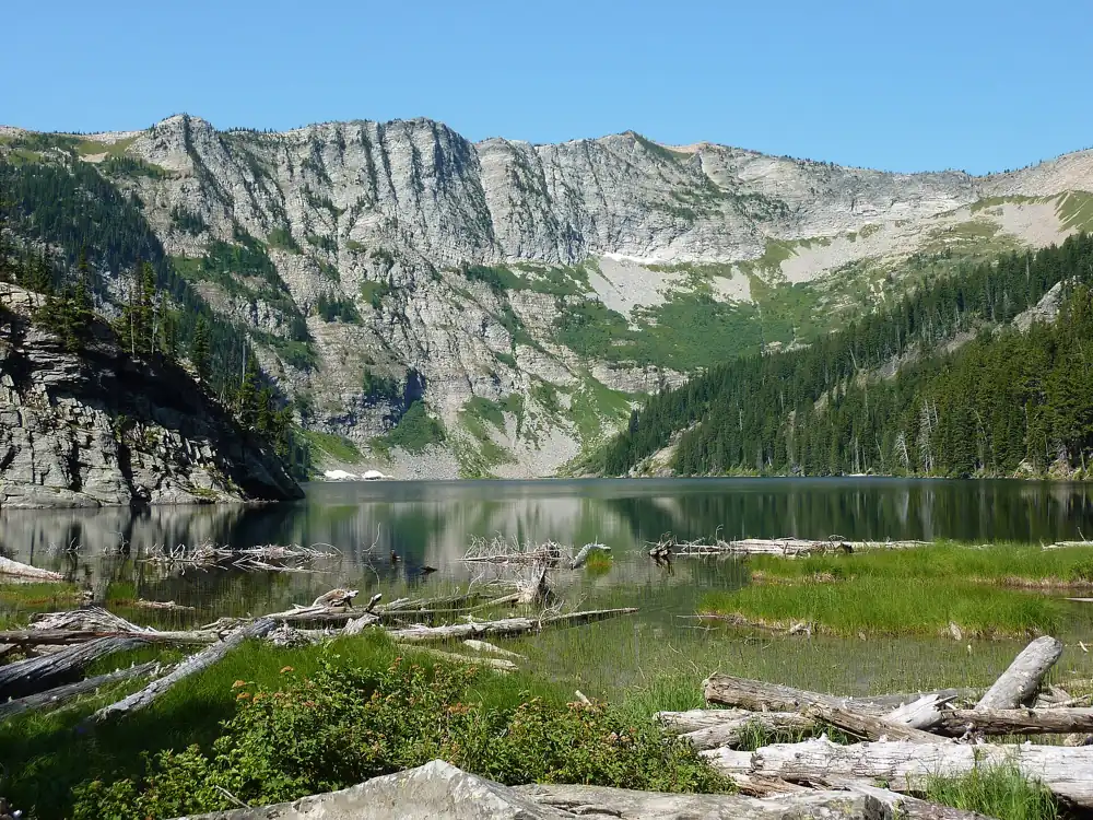 A lake below the cliffs of the Cabinet Mountains Wilderness