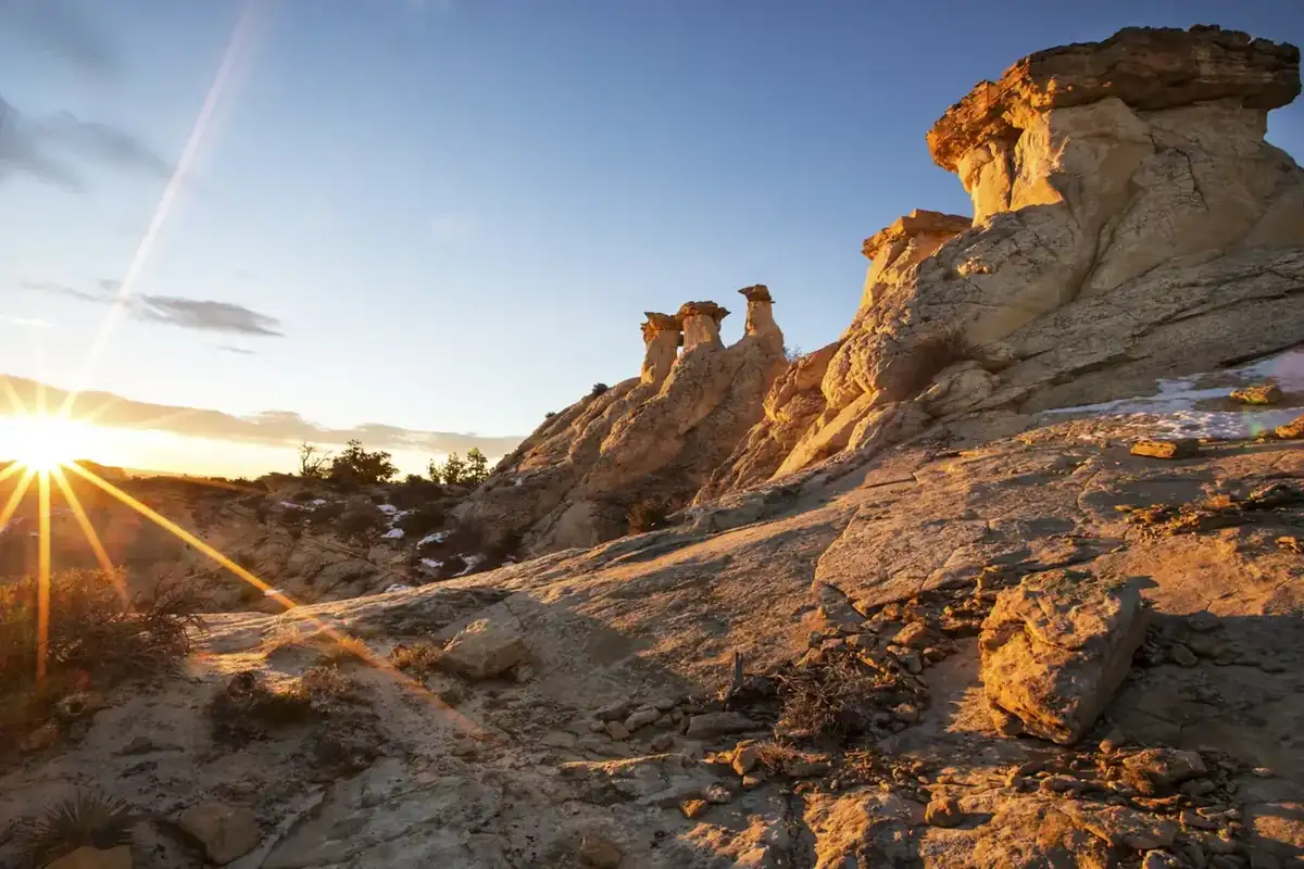 Sunrise over sandstone hoodoos in the Escalante canyon country